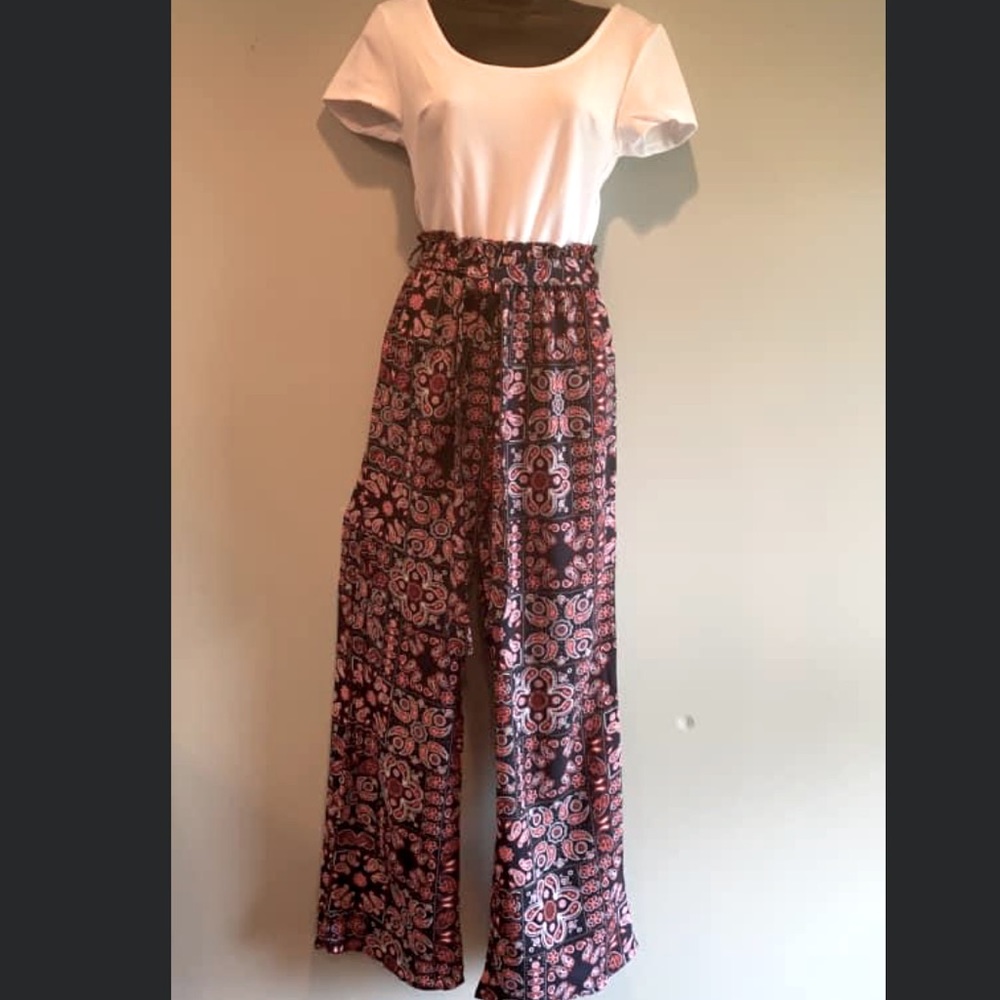Super cute pantsuit with white top and front tie.